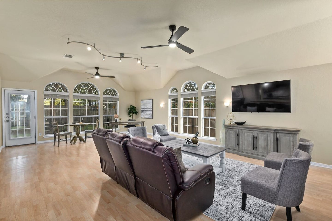 Light-filled great room with soaring ceilings and smart layout—enjoy seamless living, working, and entertaining at Machete Place.