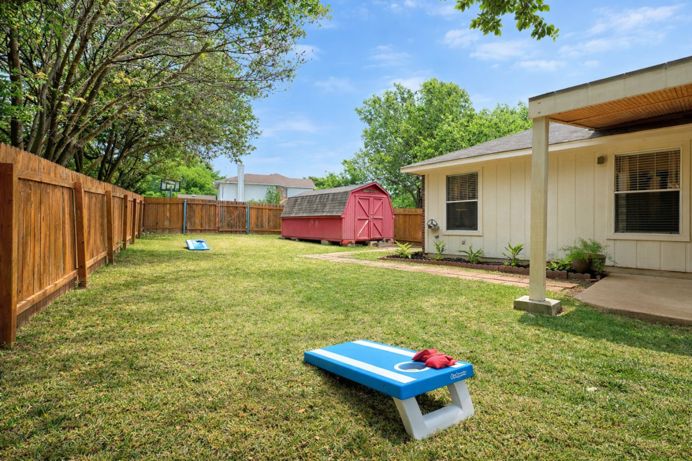 Private fenced yard for pets and family fun in North Austin.