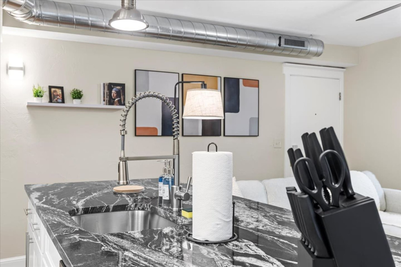 Fully equipped kitchen with all the tools you need for a perfect culinary experience. Enjoy the convenience of having everything at your fingertips!