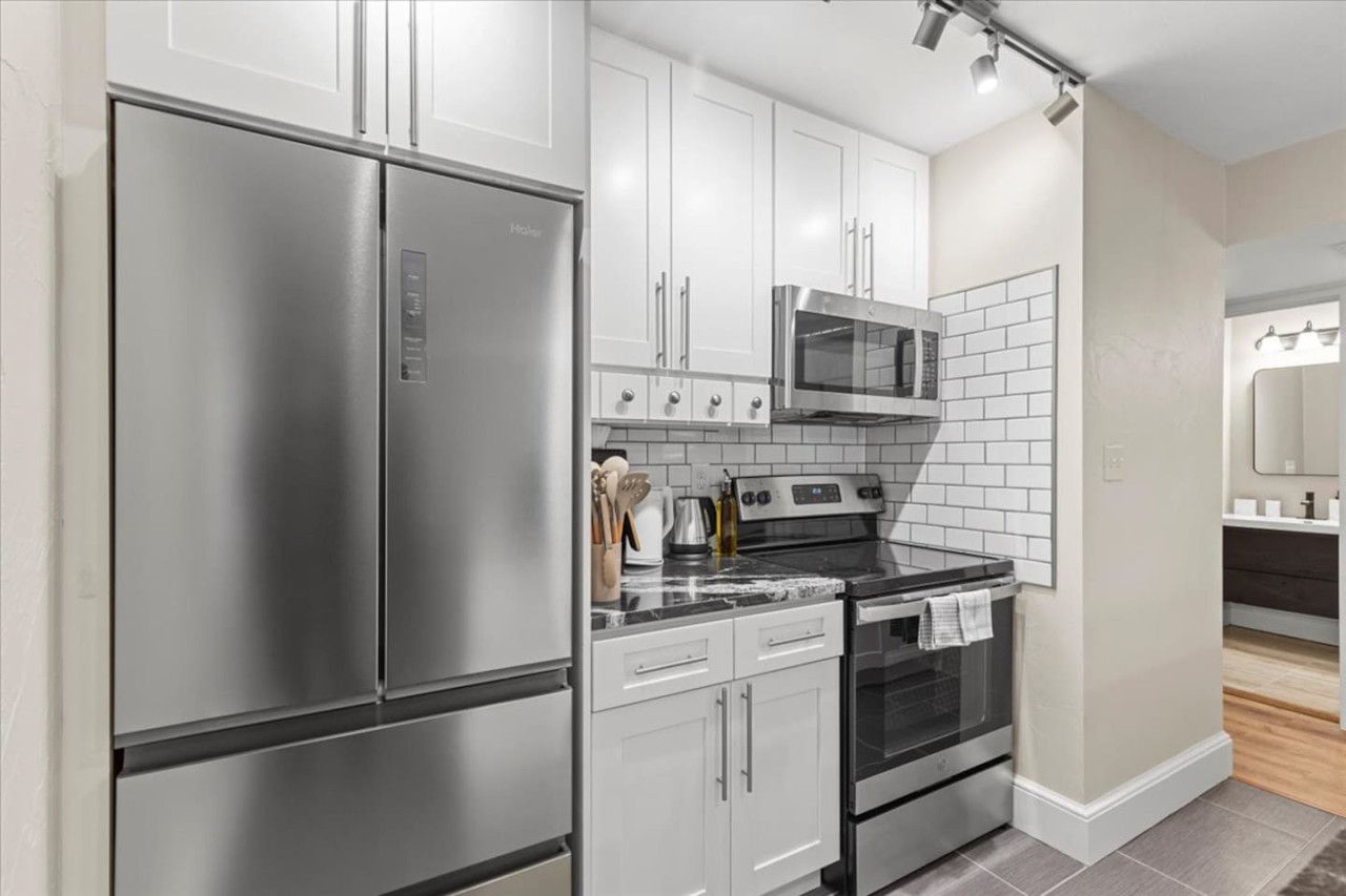 As you step into the kitchen, the clean lines and functional design make you eager to start cooking your favorite dishes.
