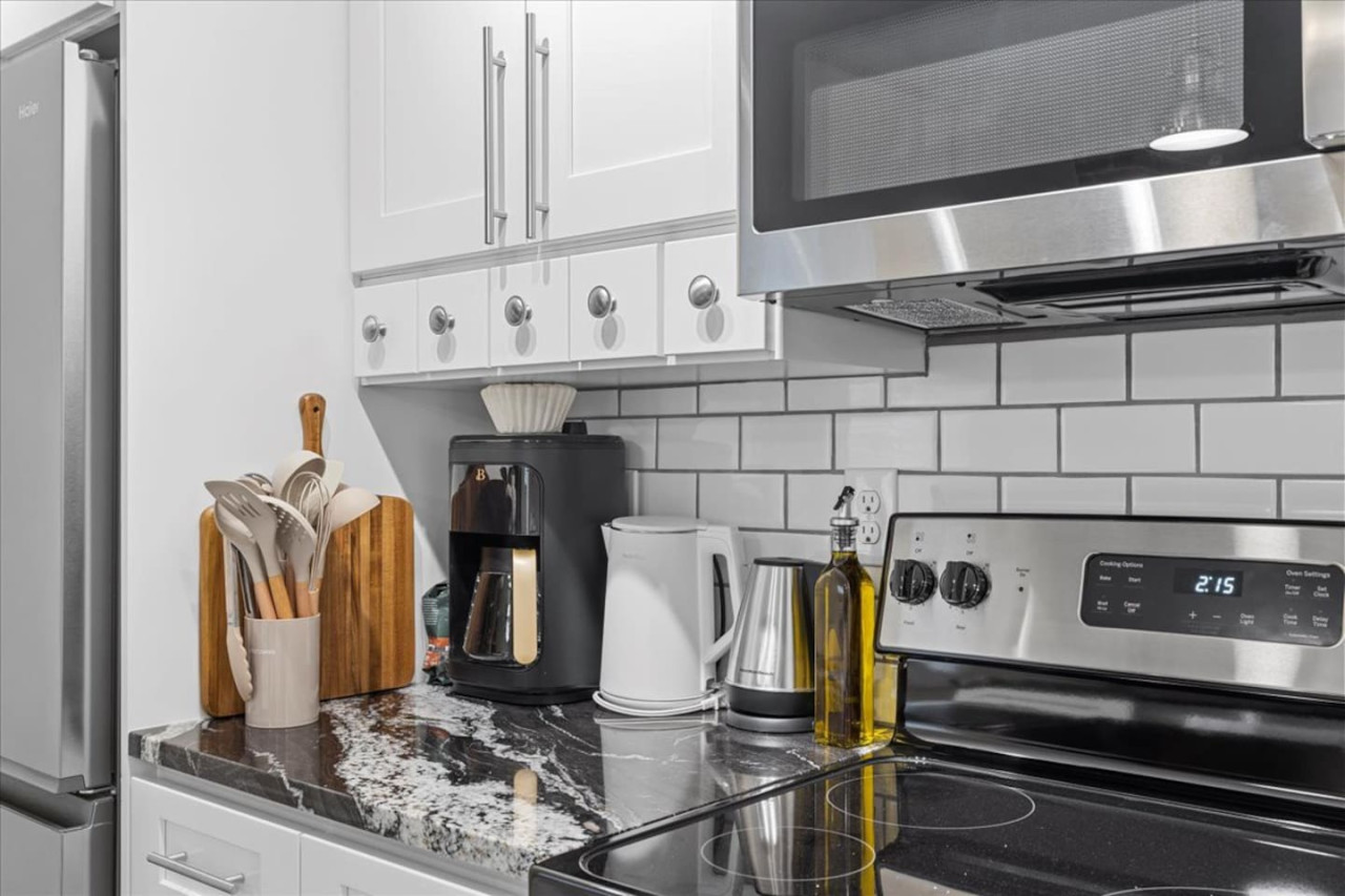 You can almost hear the sizzle of ingredients as you cook in the well-equipped kitchen, where every detail is designed for convenience.
