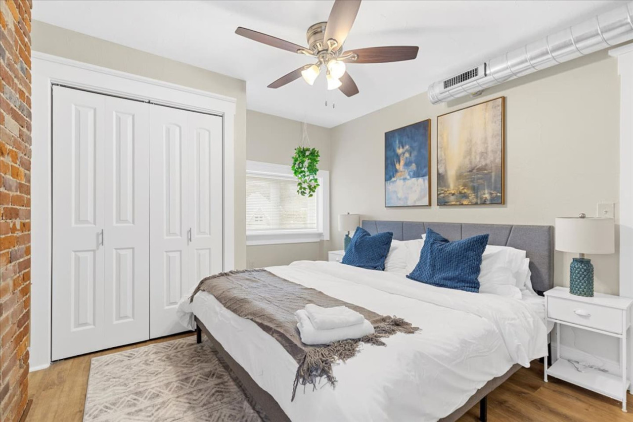 The king bedroom offers a luxurious retreat, with a bed that promises restful nights and a room that feels like a private oasis.