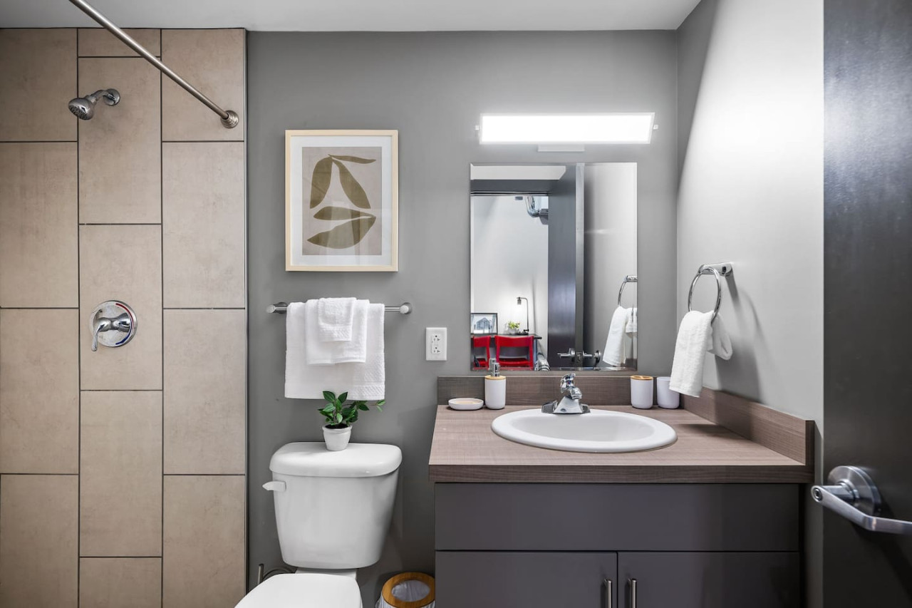 You feel a sense of calm as you enter the bathroom, where the thoughtful design and high-quality materials create a serene environment.