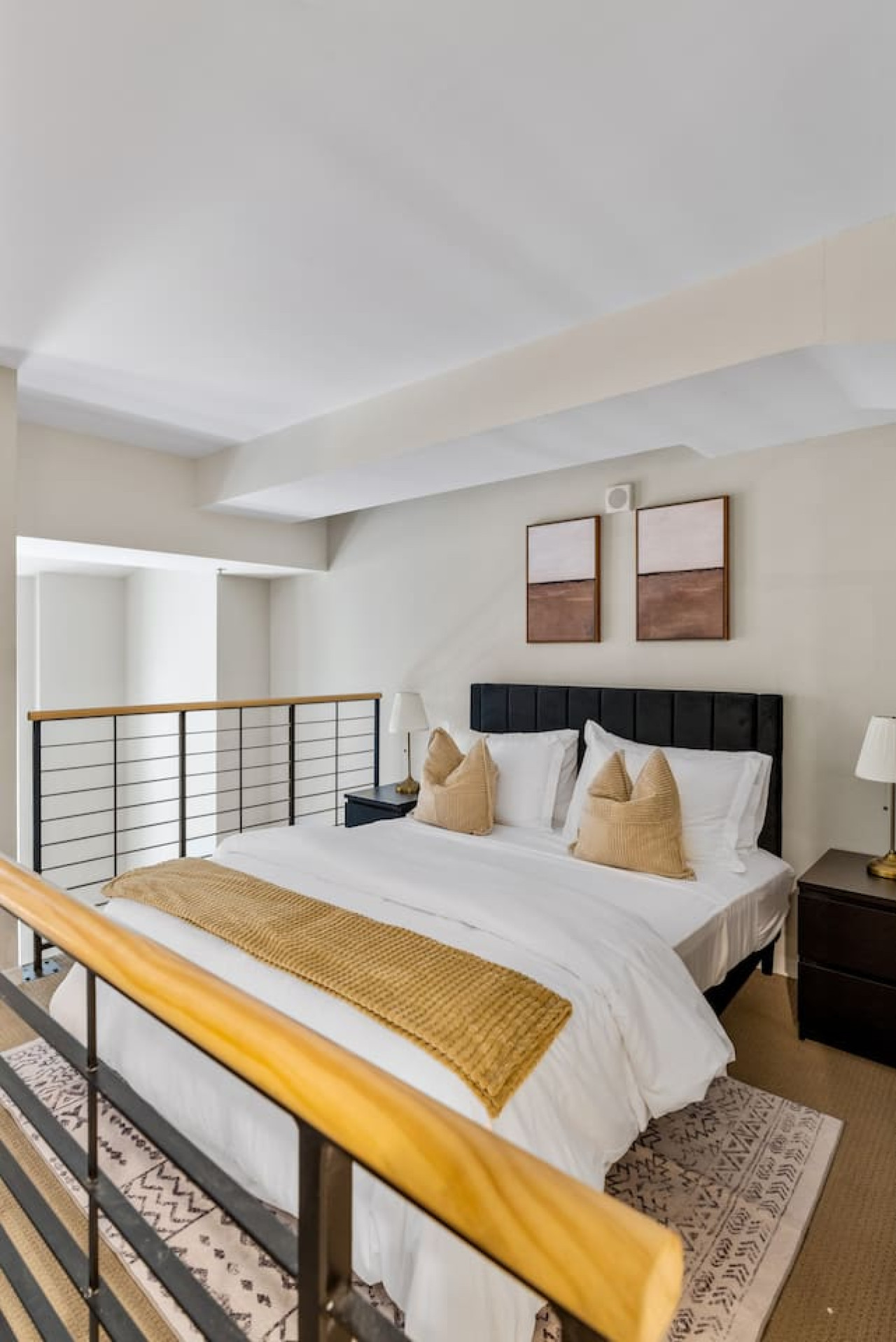 The bedroom’s serene ambiance invites you to relax, with a plush bed that promises a restful night's sleep.