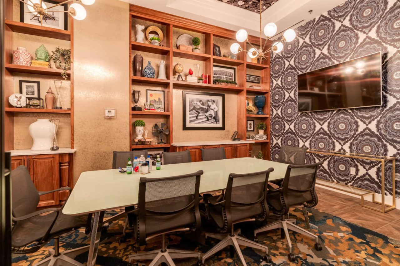 The spacious dining room invites you to savor every moment, whether enjoying a quiet meal or hosting a festive gathering.
