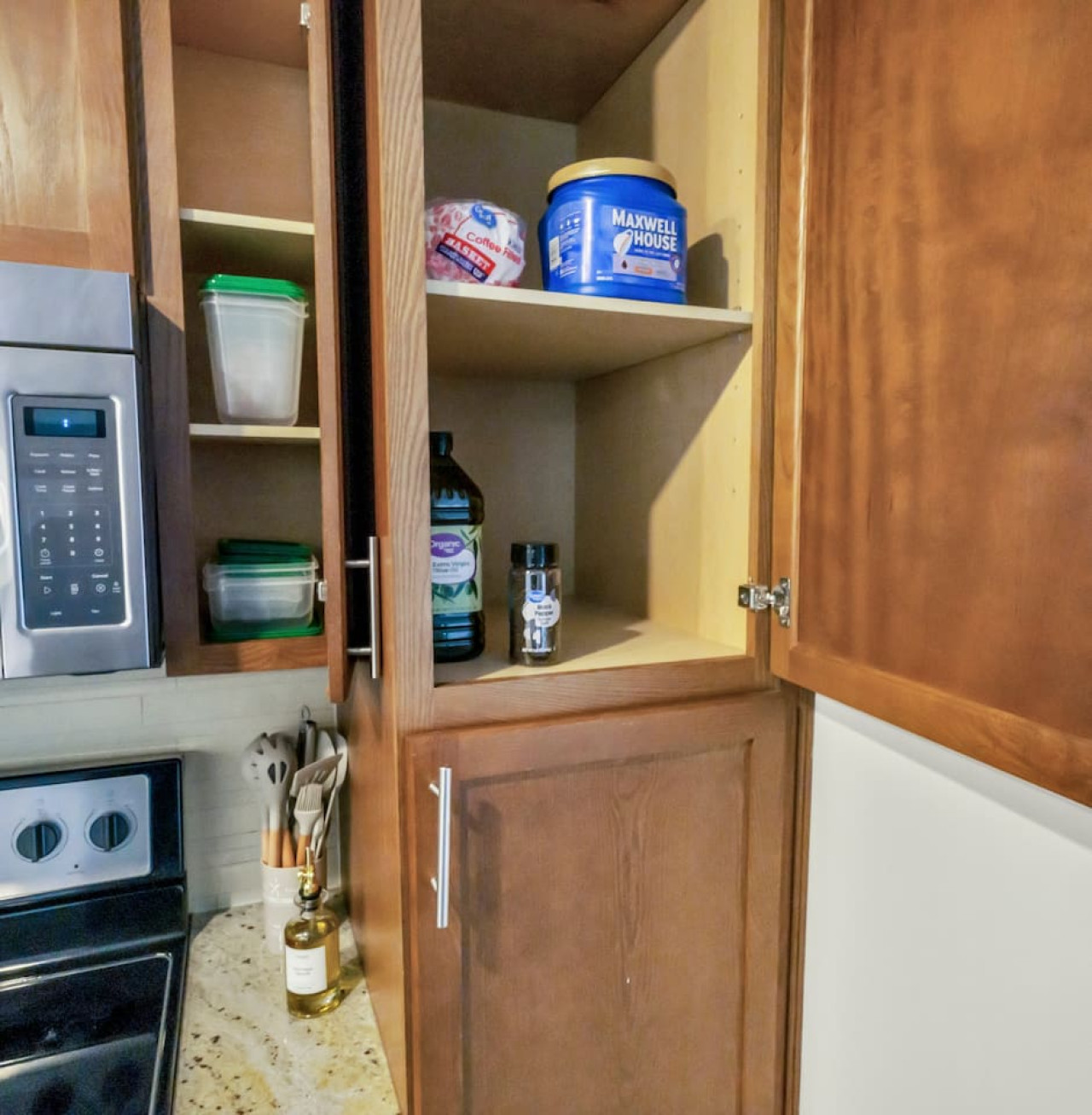 As you approach kitchen the elegant layout and well-stocked shelves make it the ideal spot to relax.