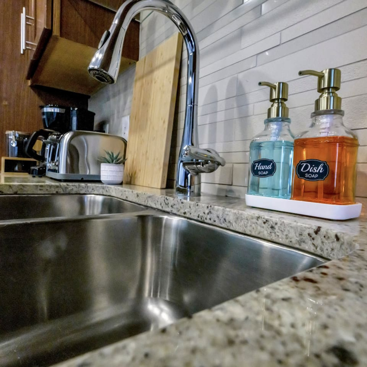 Fully equipped kitchen with all the tools you need for a perfect culinary experience. Enjoy the convenience of having everything at your fingertips!