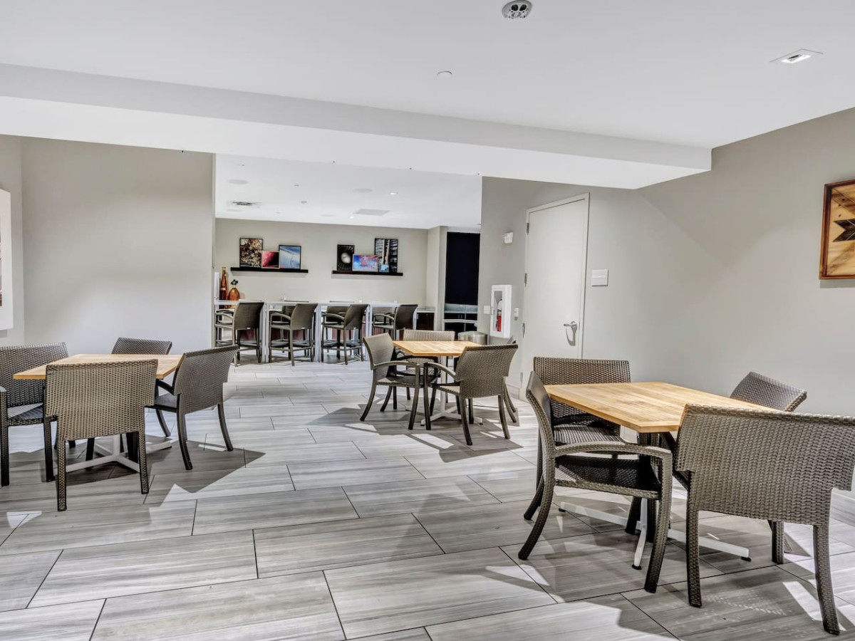 An open-concept area featuring a modern furnishings, and a stylish entertainment setup—ideal for gatherings and relaxation.
