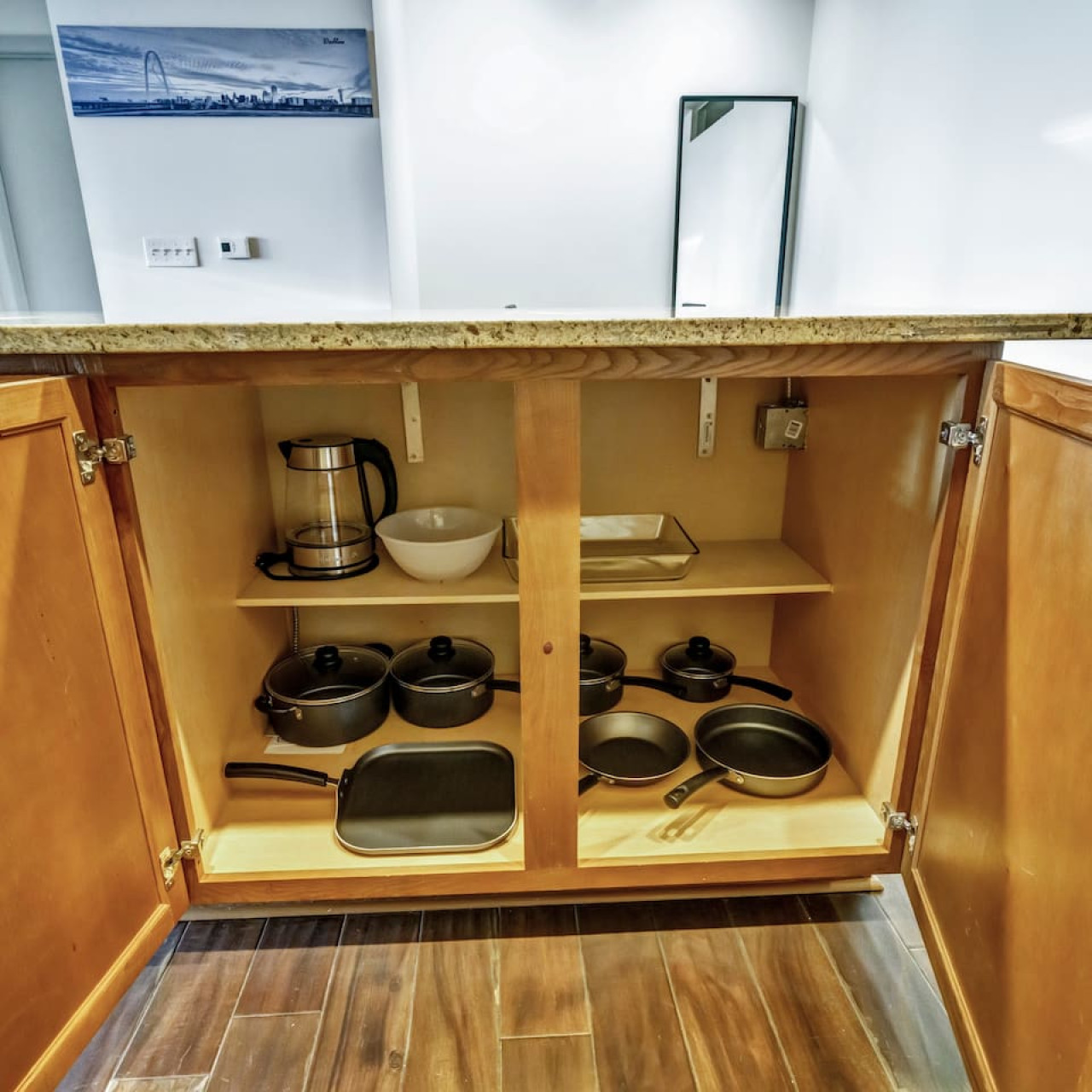 As you approach kitchen the elegant layout and well-stocked shelves make it the ideal spot to relax.