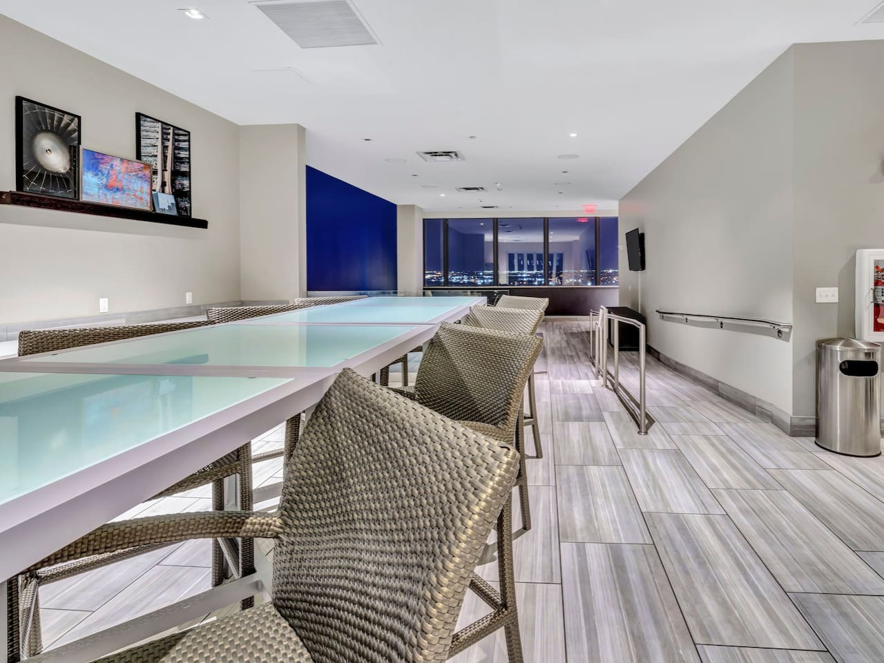 An open-concept area featuring a modern furnishings, and a stylish entertainment setup—ideal for gatherings and relaxation.
