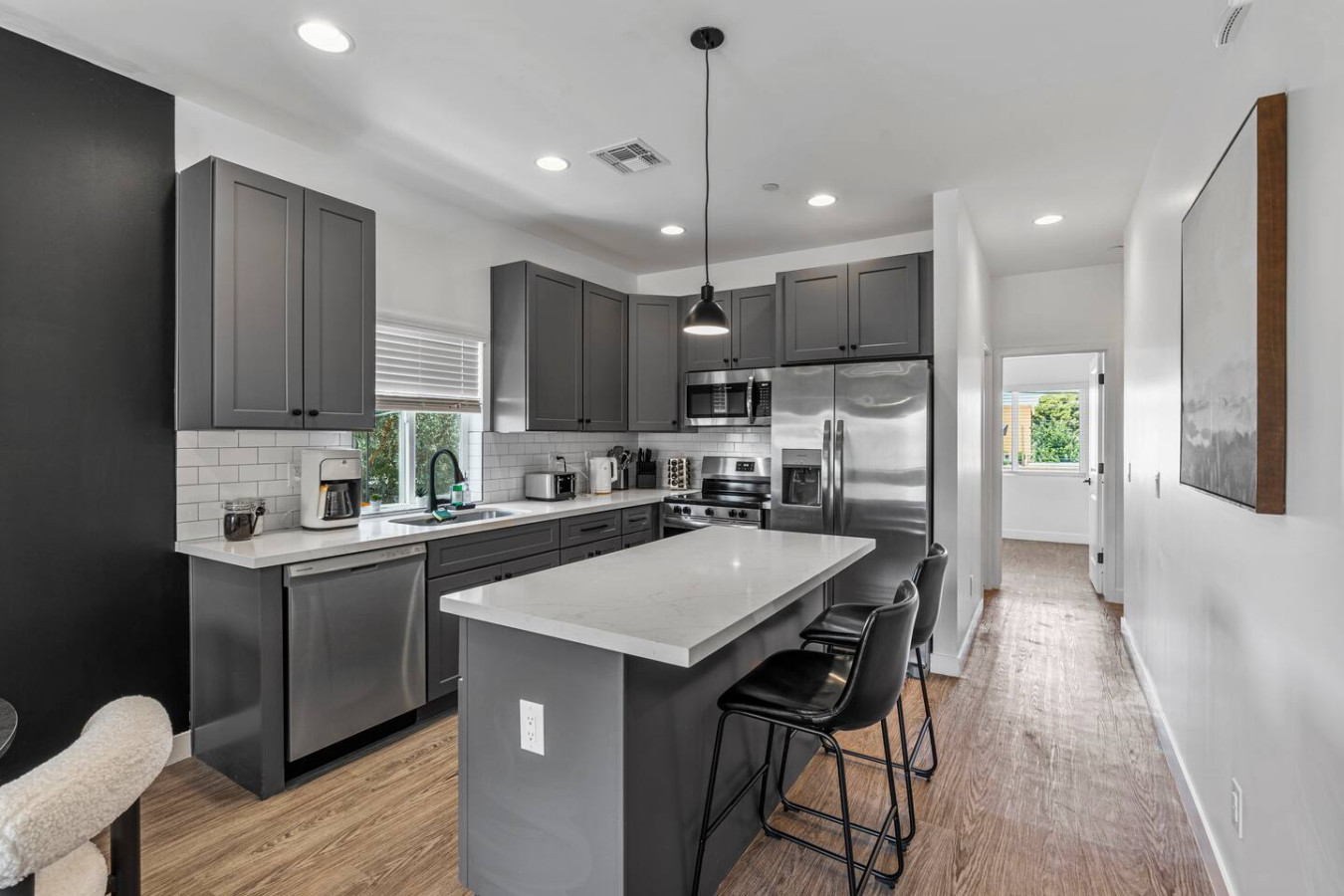 As you step into the kitchen, the clean lines and functional design make you eager to start cooking your favorite dishes.