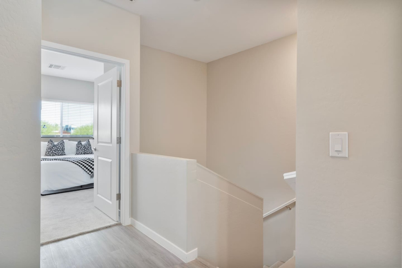 As you enter the bedroom, the comfortable bedding and peaceful atmosphere create the perfect retreat from the day.