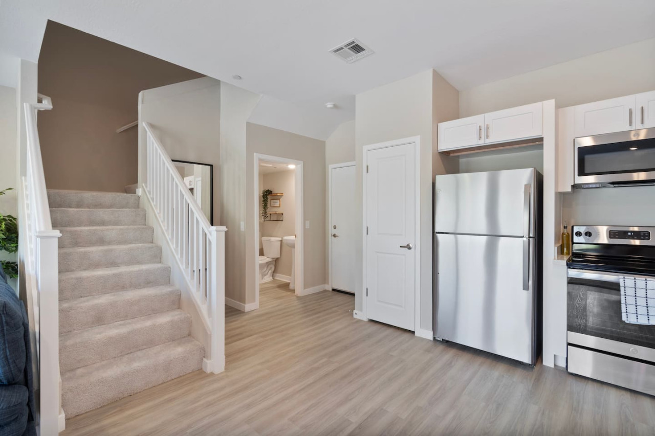 The stairs are both functional and beautiful, with a design that enhances the home’s aesthetic appeal.