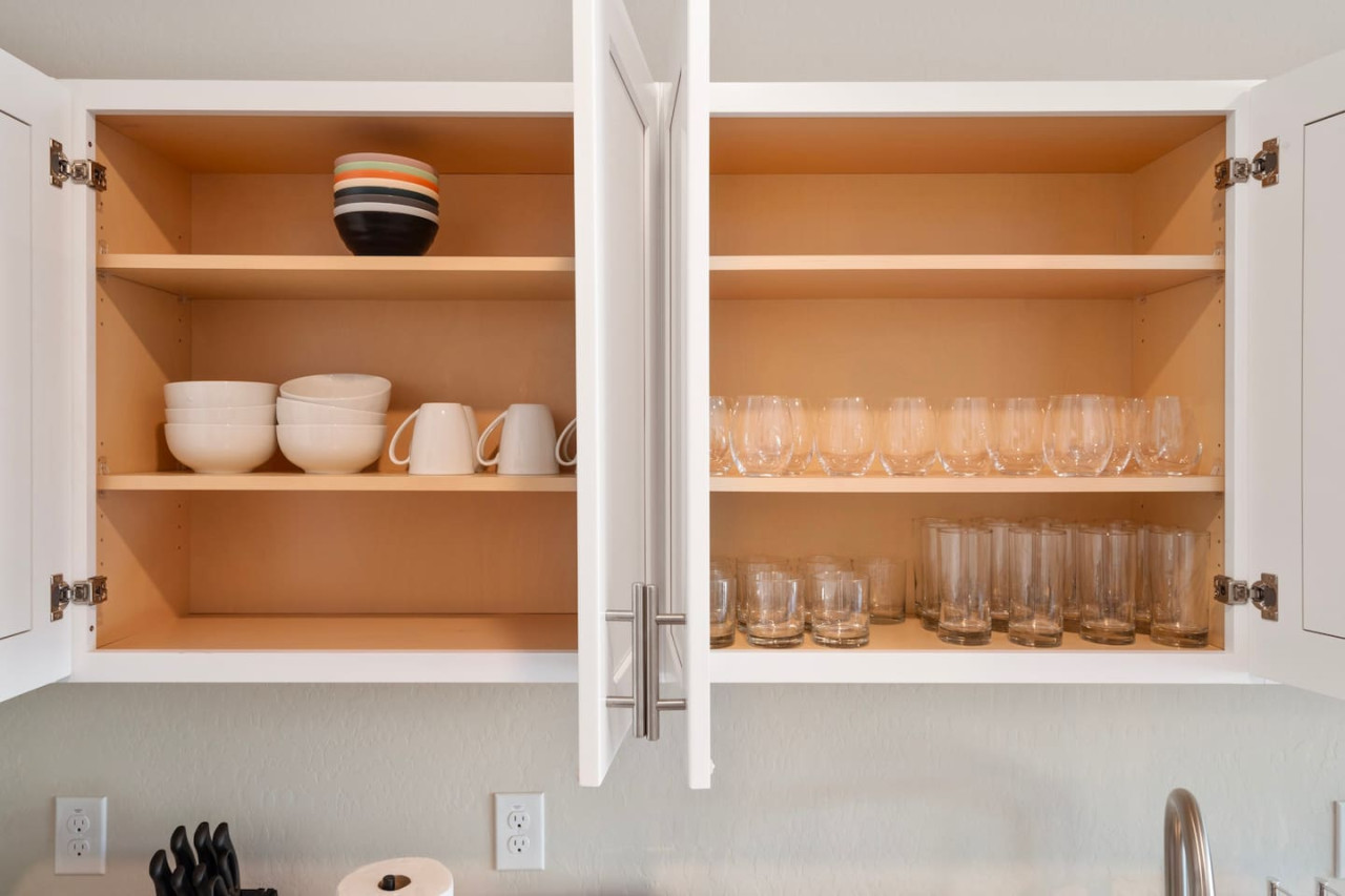 As you approach kitchen the elegant layout and well-stocked shelves make it the ideal spot to relax.