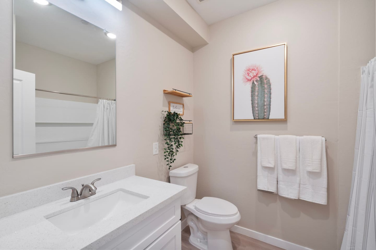 You feel a sense of calm as you enter the bathroom, where the thoughtful design and high-quality materials create a serene environment.