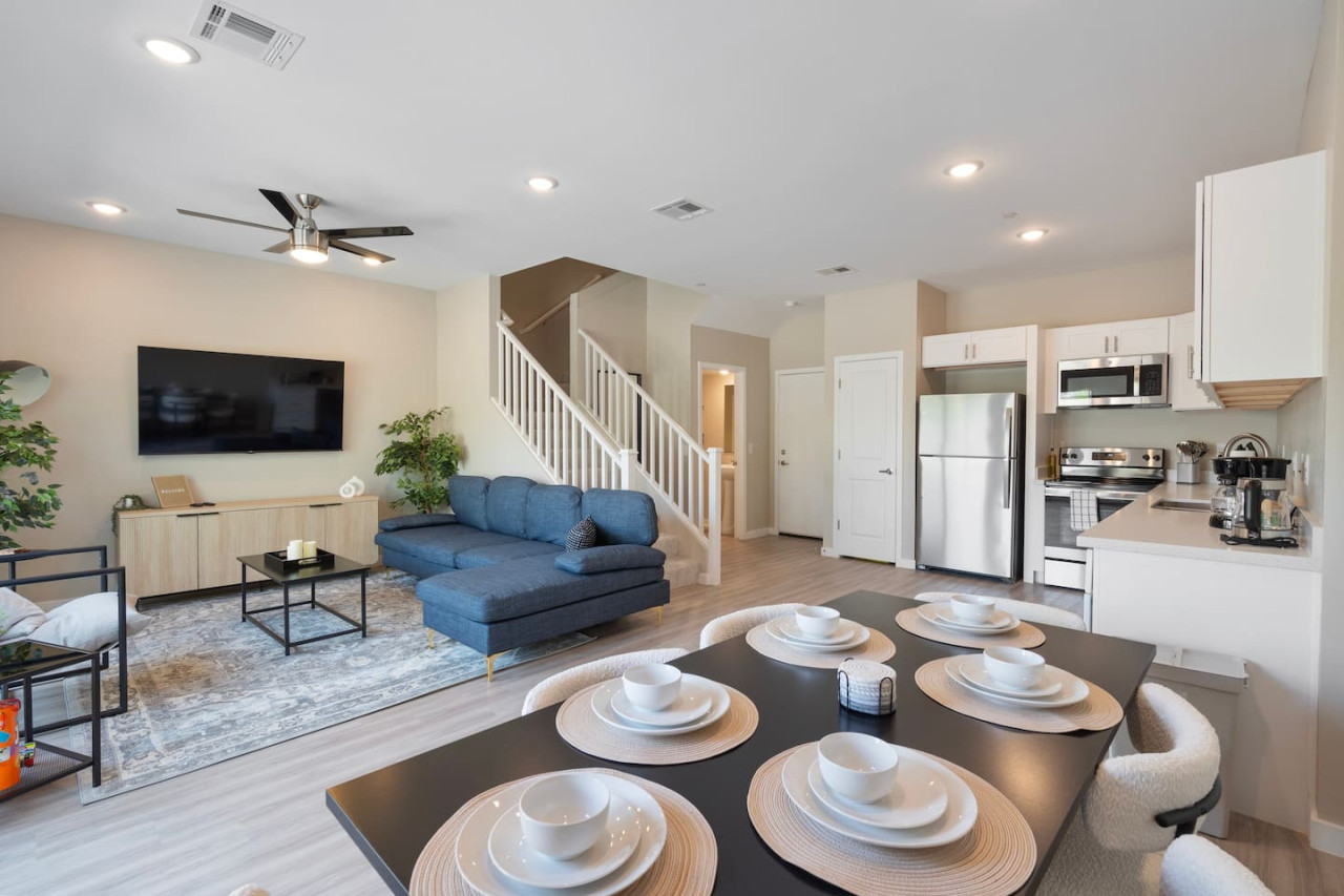 You are surrounded by tasteful decor and warm tones, making the dining room a perfect setting for any occasion.