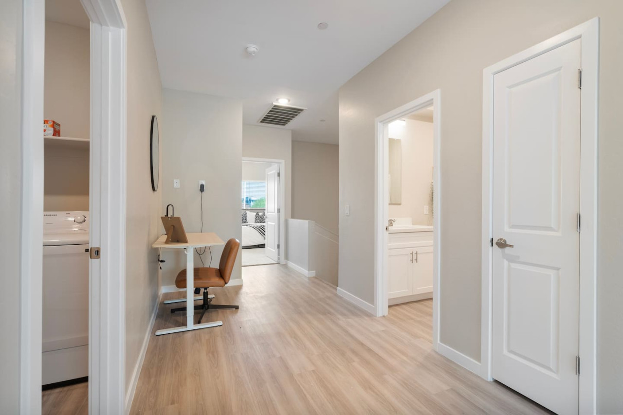 An open-concept area featuring a modern furnishings, and a stylish entertainment setup—ideal for gatherings and relaxation.