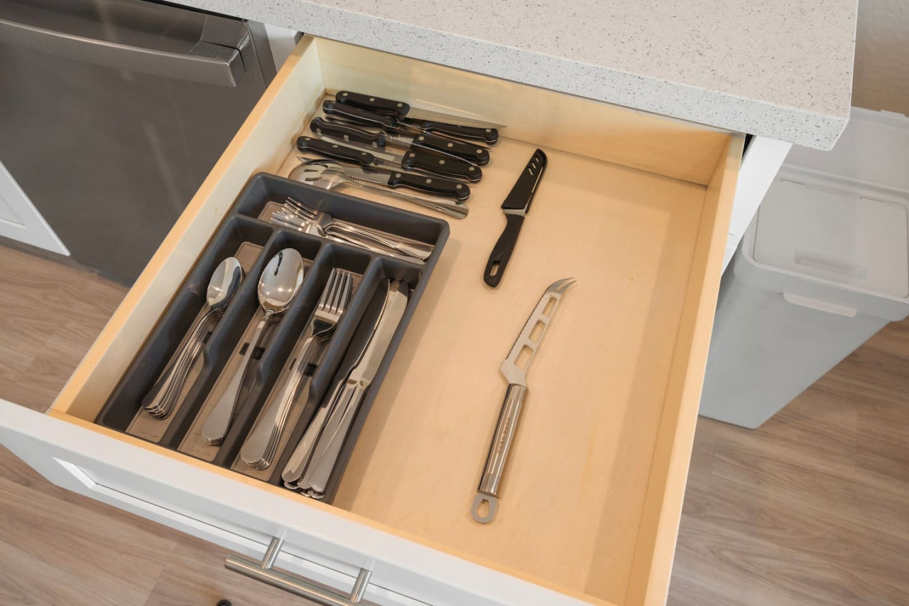 Fully equipped kitchen with all the tools you need for a perfect culinary experience. Enjoy the convenience of having everything at your fingertips!