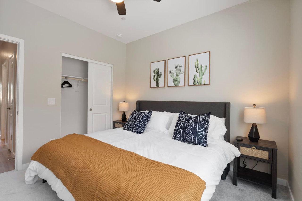 Spacious bedroom with stylish decor, perfect for unwinding after a day of exploring the local area.