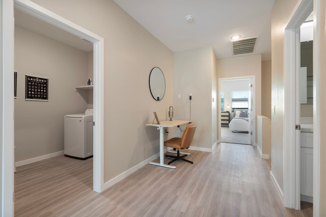 An open-concept area featuring a modern furnishings, and a stylish entertainment setup—ideal for gatherings and relaxation.