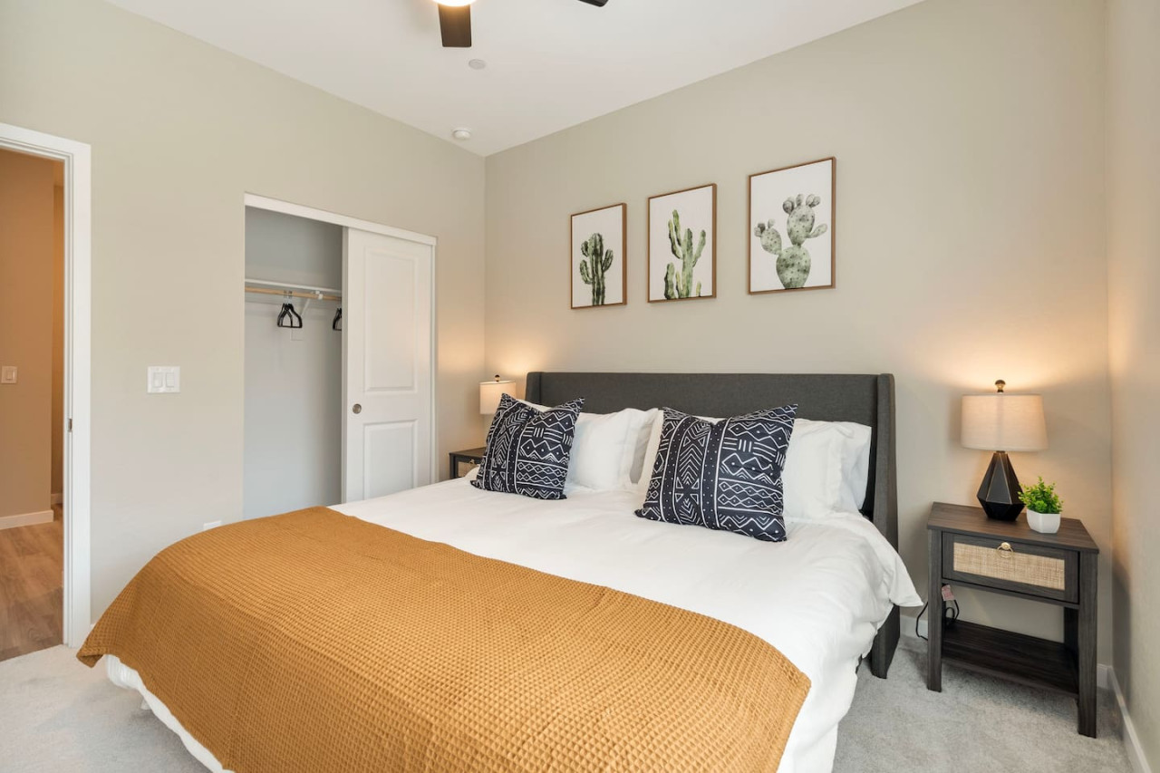 The king bedroom offers a luxurious retreat, with a bed that promises restful nights and a room that feels like a private oasis.