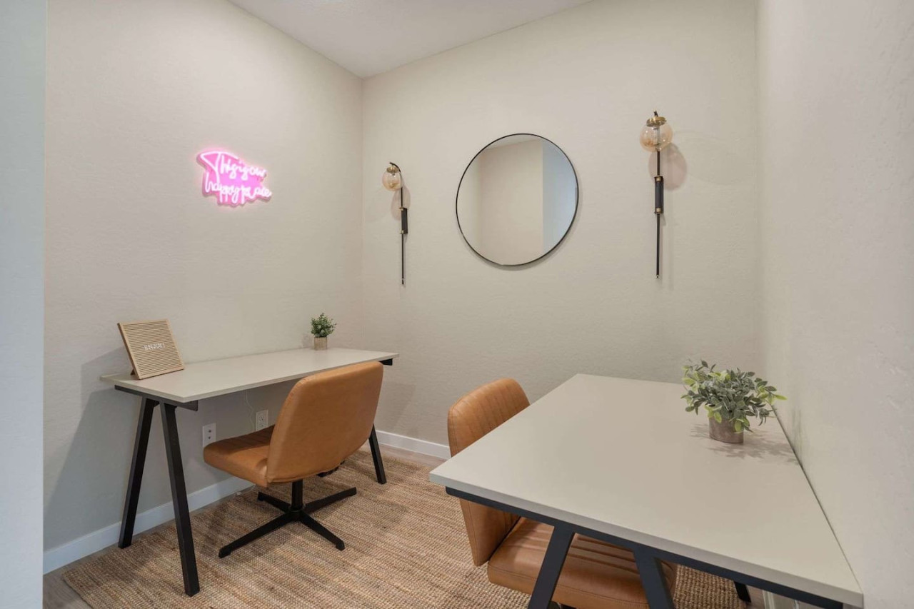 This cozy workspace area is perfect for productivity. Enjoy natural light, a comfortable chair, and a stylish desk setup. Ideal for work-from-home needs or planning your Dallas adventures.