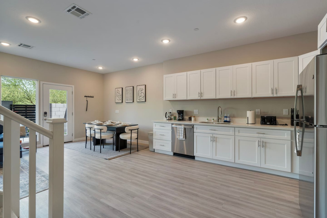 You’ll love the convenience of this fully equipped kitchen, where you can brew coffee, cook meals, or prepare snacks. The cozy layout and warm ambiance make cooking here a delightful part of your stay.