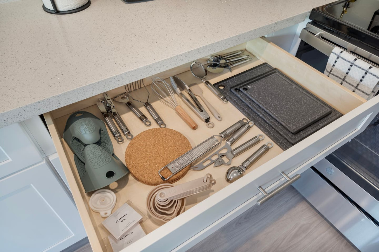 Fully equipped kitchen with all the tools you need for a perfect culinary experience. Enjoy the convenience of having everything at your fingertips!