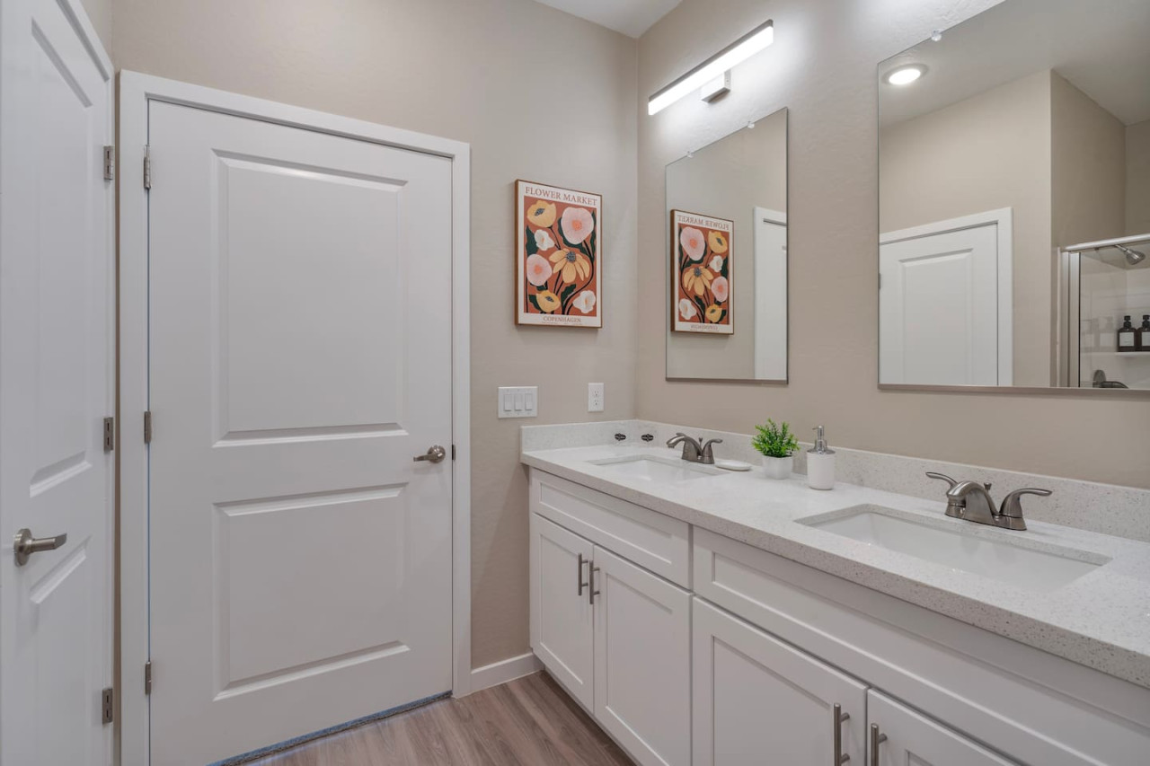 You feel a sense of calm as you enter the bathroom, where the thoughtful design and high-quality materials create a serene environment.