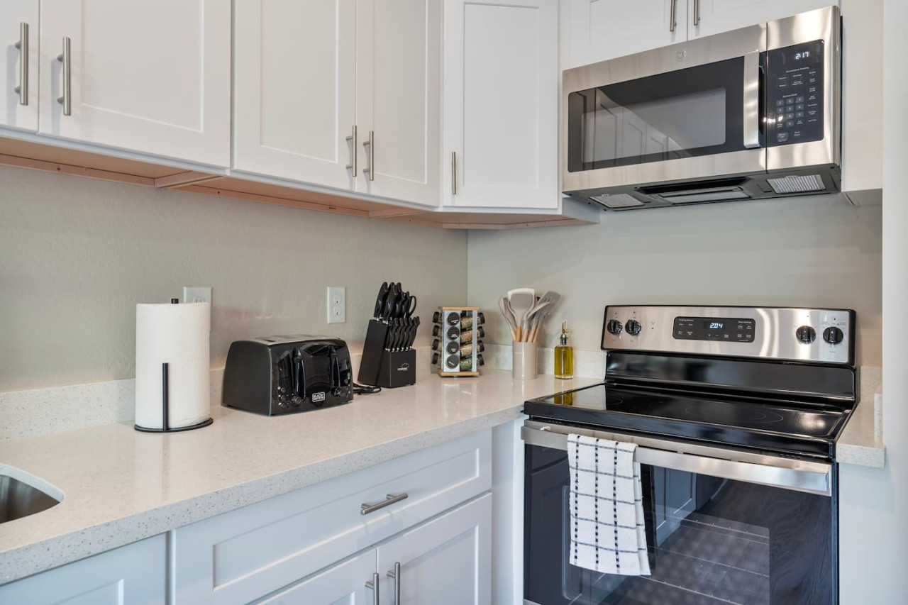 As you step into the kitchen, the clean lines and functional design make you eager to start cooking your favorite dishes.