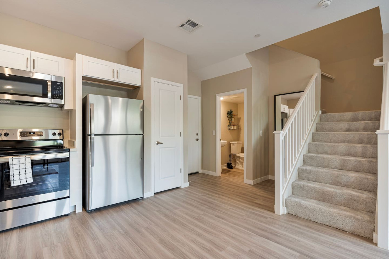 The stairs are both functional and beautiful, with a design that enhances the home’s aesthetic appeal.