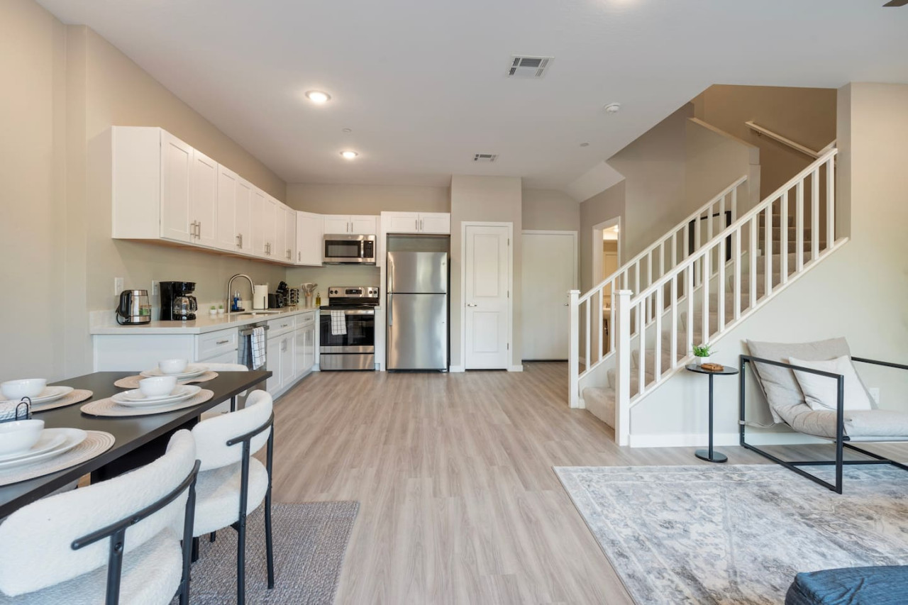 An open-concept area featuring a modern furnishings, and a stylish entertainment setup—ideal for gatherings and relaxation.