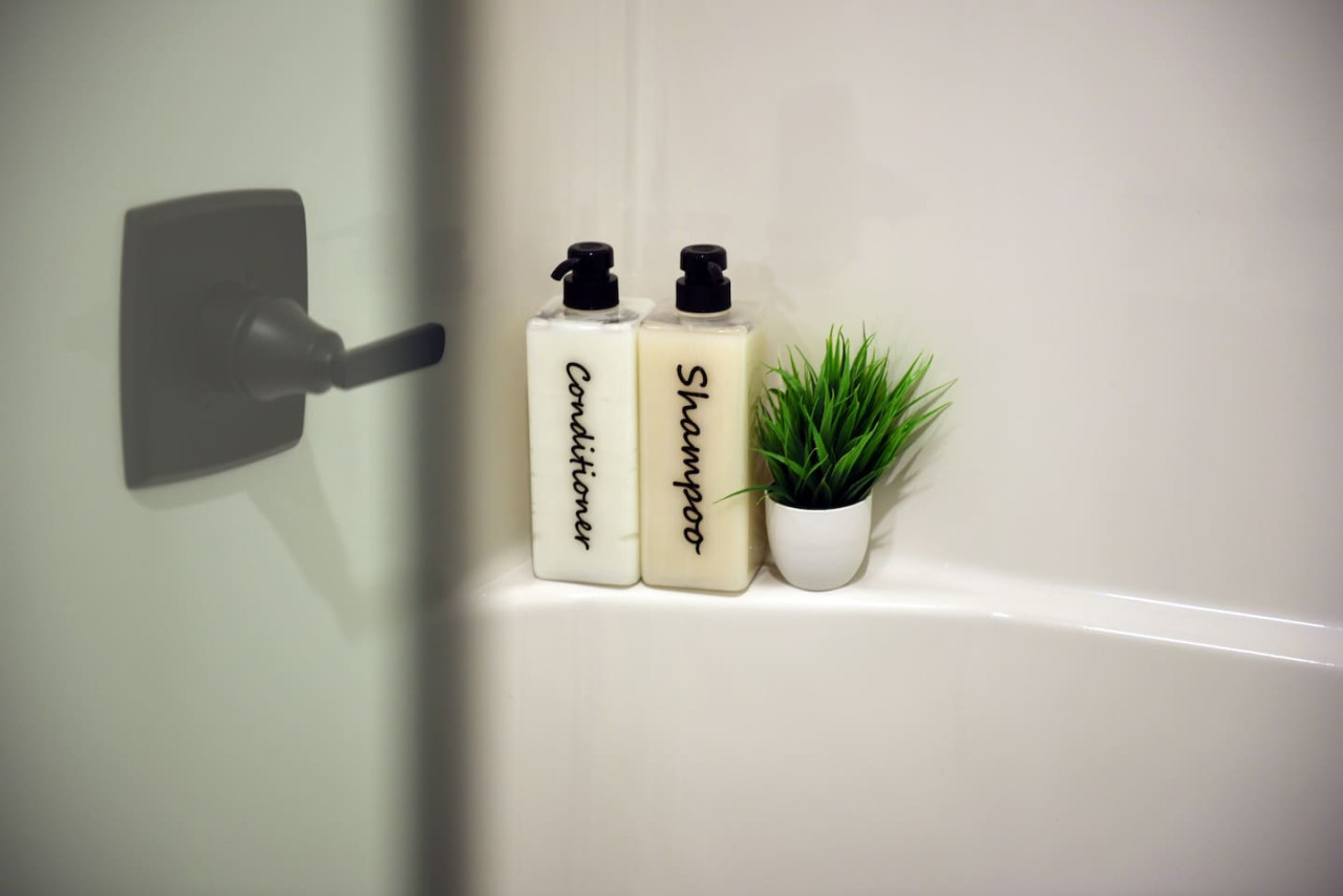 You feel a sense of calm as you enter the bathroom, where the thoughtful design and high-quality materials create a serene environment.