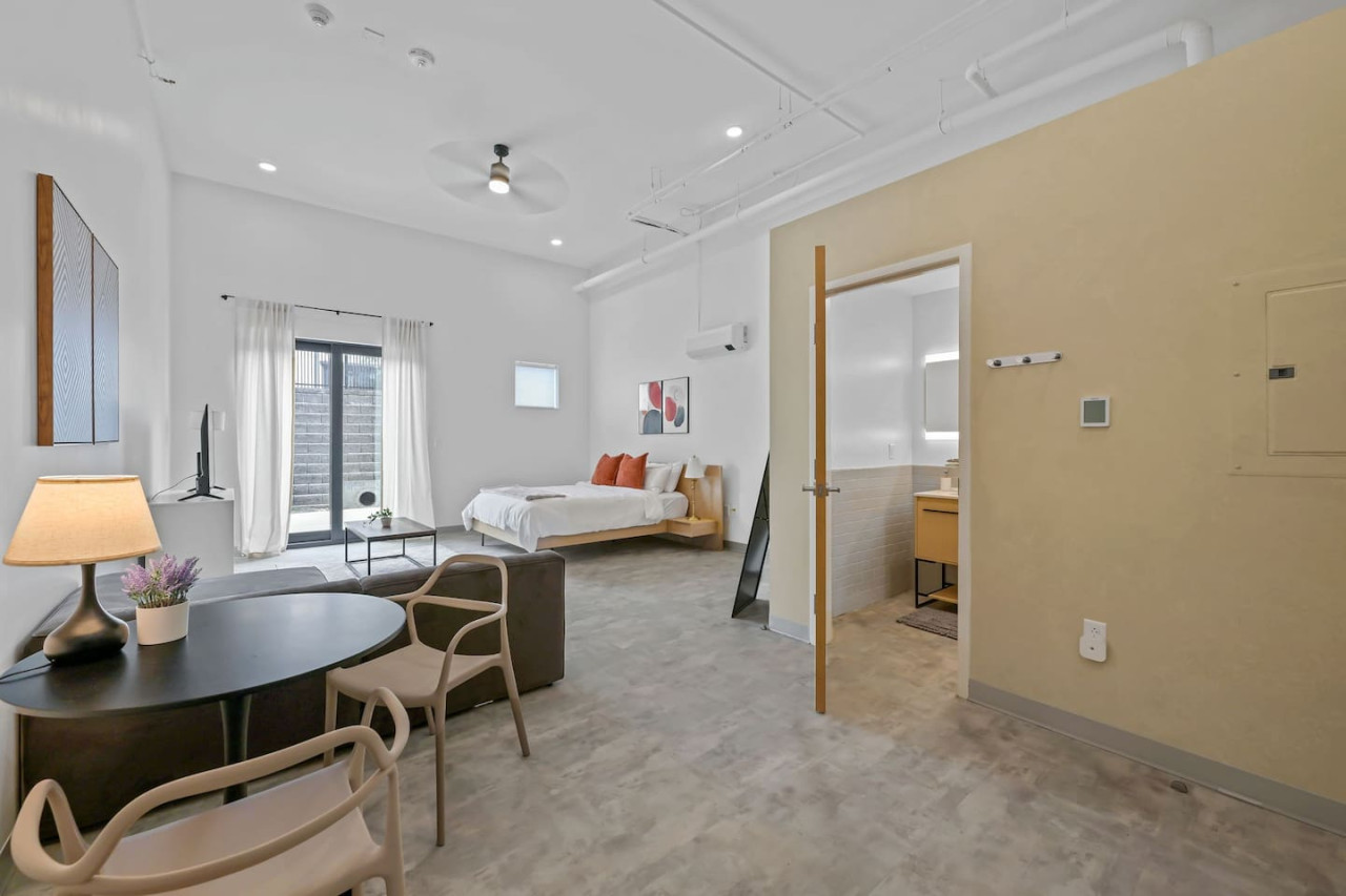 You’ll feel enveloped in warmth in this charming room with its rich wood accents and inviting bed. Wake up refreshed, surrounded by rustic coziness, and enjoy the perfect mix of comfort and natural vibes