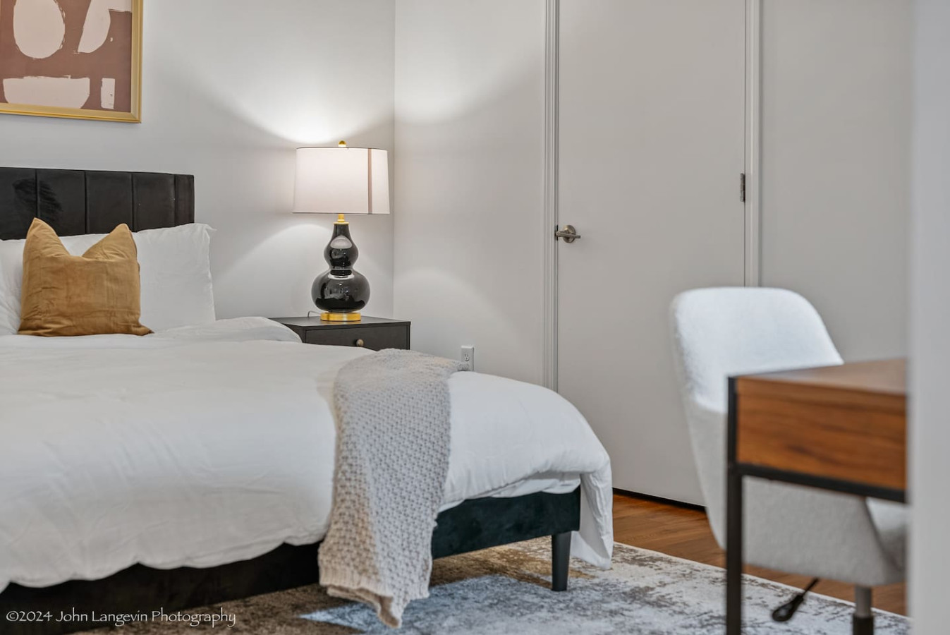 As you enter the bedroom, the comfortable bedding and peaceful atmosphere create the perfect retreat from the day.