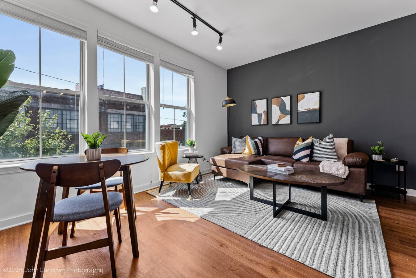 An open-concept area featuring a modern furnishings, and a stylish entertainment setup—ideal for gatherings and relaxation.