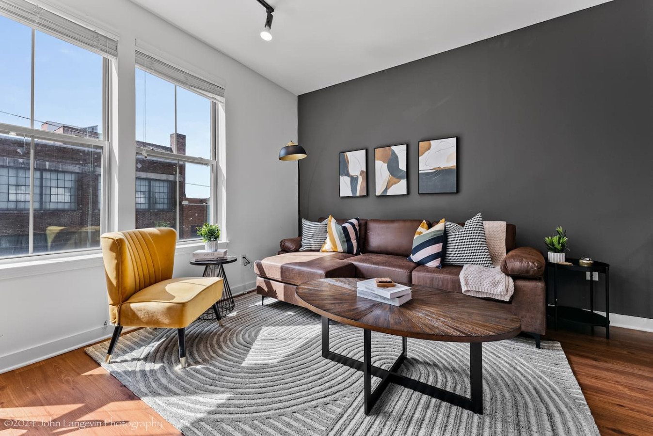 As you take a seat in the living room, the comfortable furniture and tasteful design make it easy to unwind.
