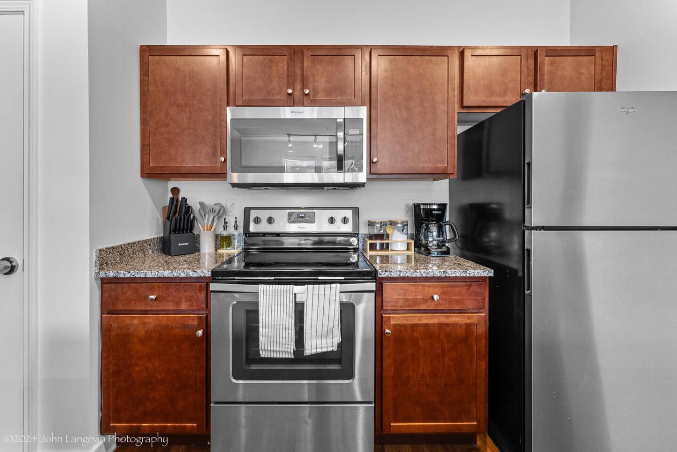 As you approach kitchen the elegant layout and well-stocked shelves make it the ideal spot to relax.