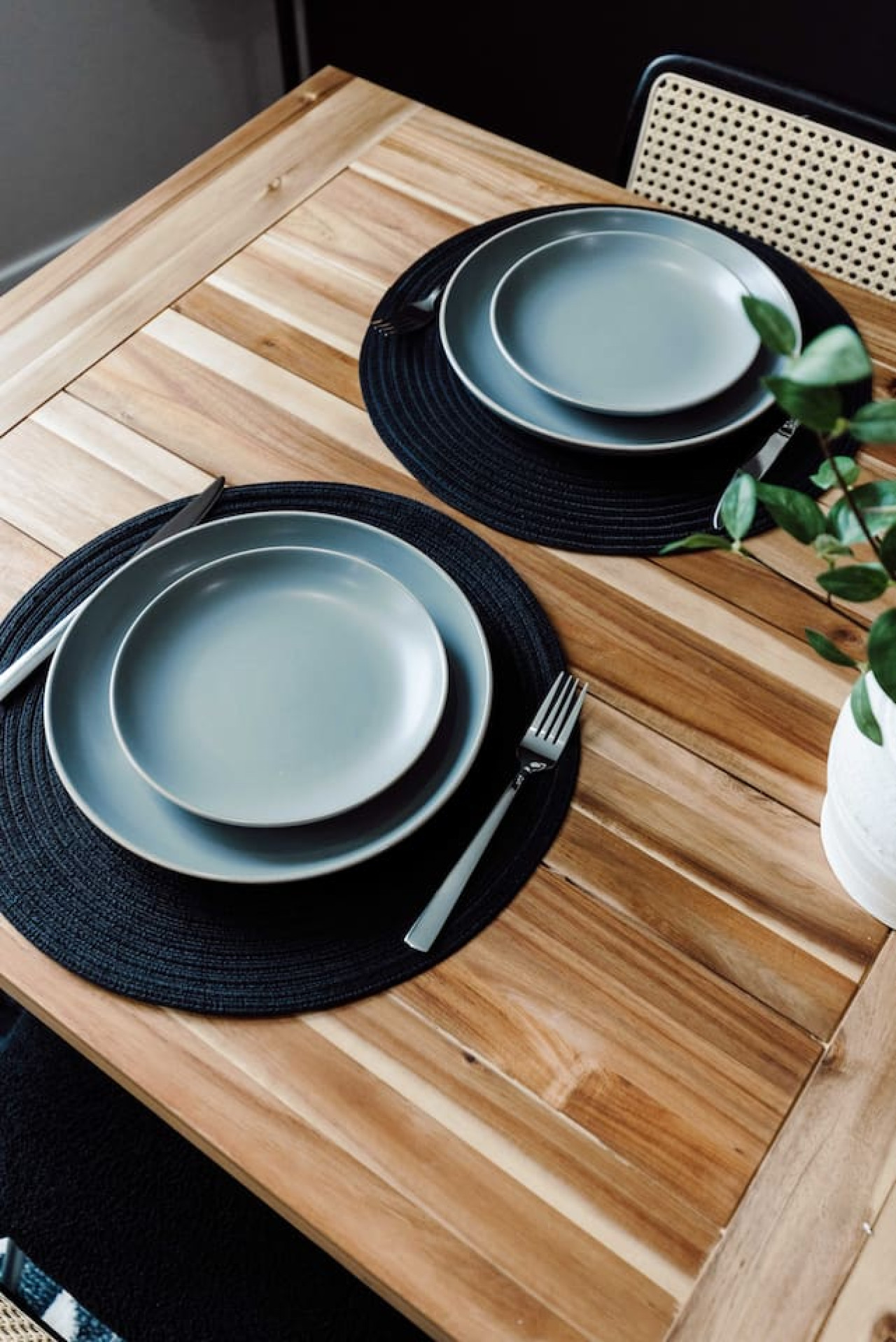 Set the table for memorable meals in this beautifully arranged dining area. With elegant place settings and a charming centerpiece, it's perfect for hosting dinner parties or enjoying family dinners in a cozy and stylish atmosphere.