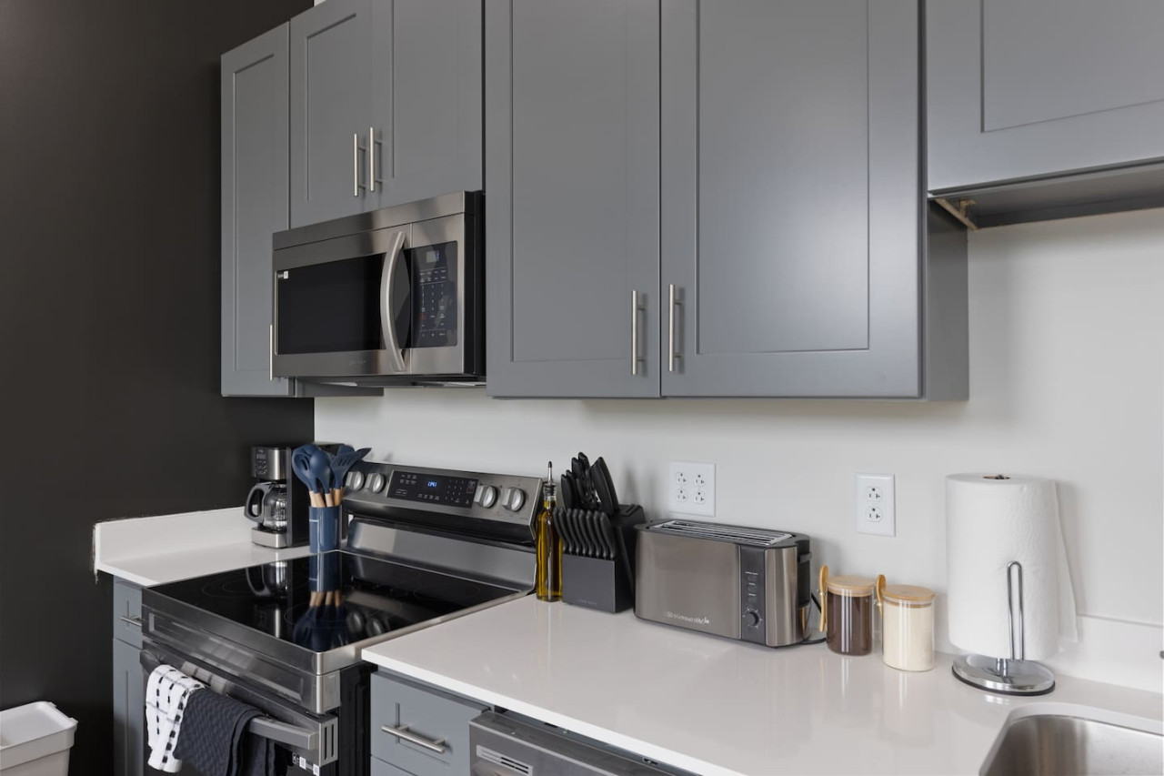 As you approach kitchen the elegant layout and well-stocked shelves make it the ideal spot to relax.