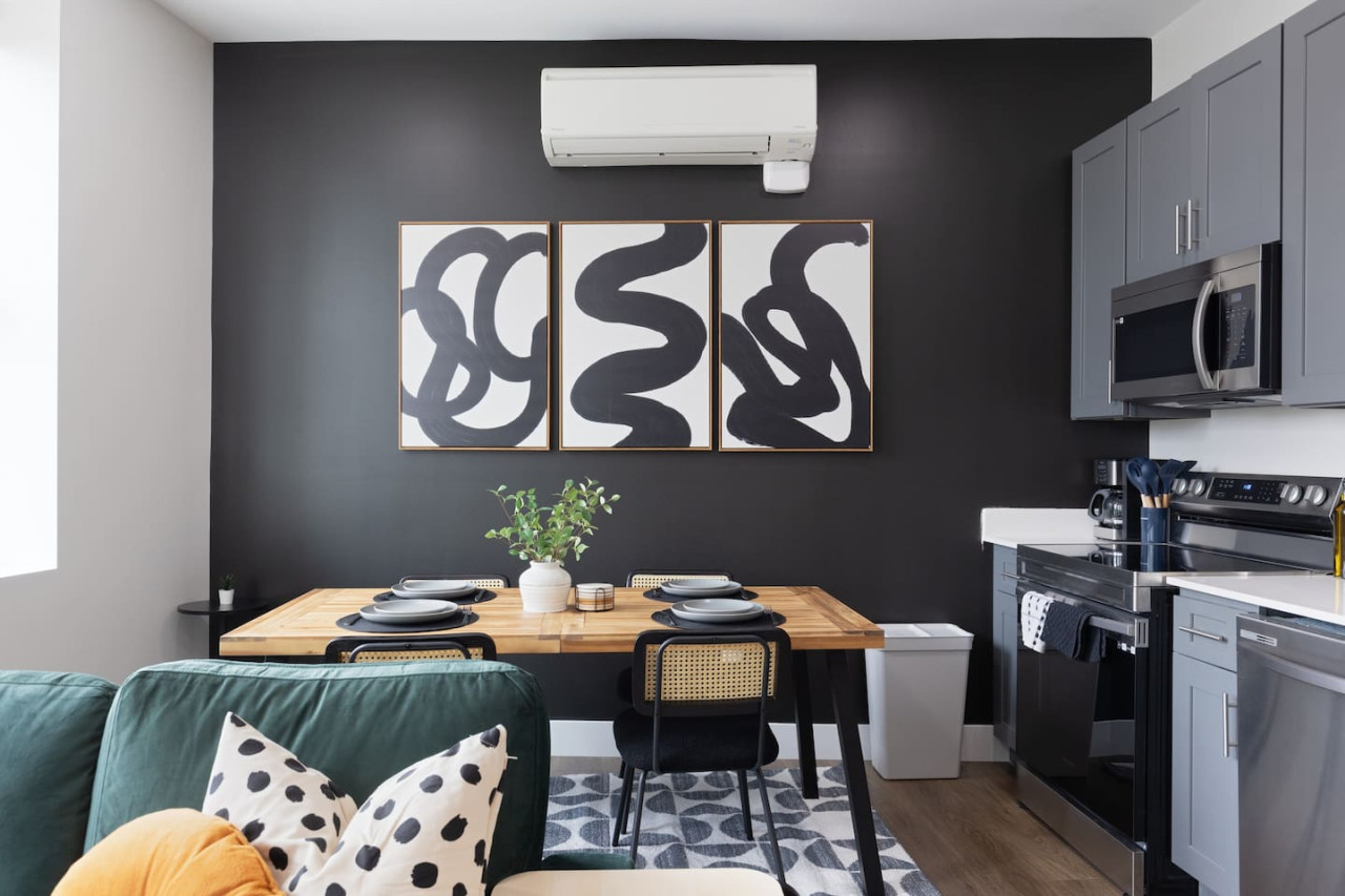 Set the table for memorable meals in this beautifully arranged dining area. With elegant place settings and a charming centerpiece, it's perfect for hosting dinner parties or enjoying family dinners in a cozy and stylish atmosphere.