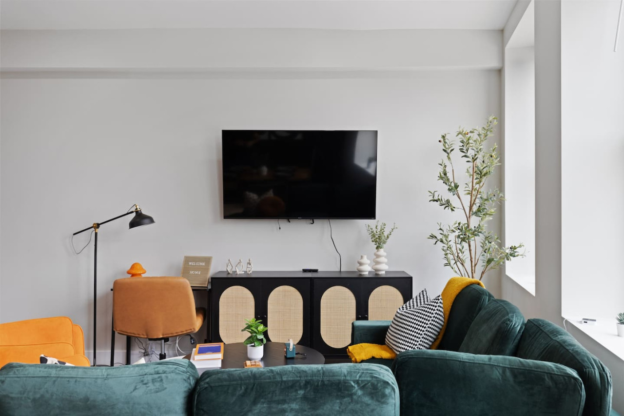 Relax in this warm, inviting space with warm accents and cozy furnishings. You’ll love unwinding on the plush sofa, enjoying or streaming your favorite shows in a serene atmosphere