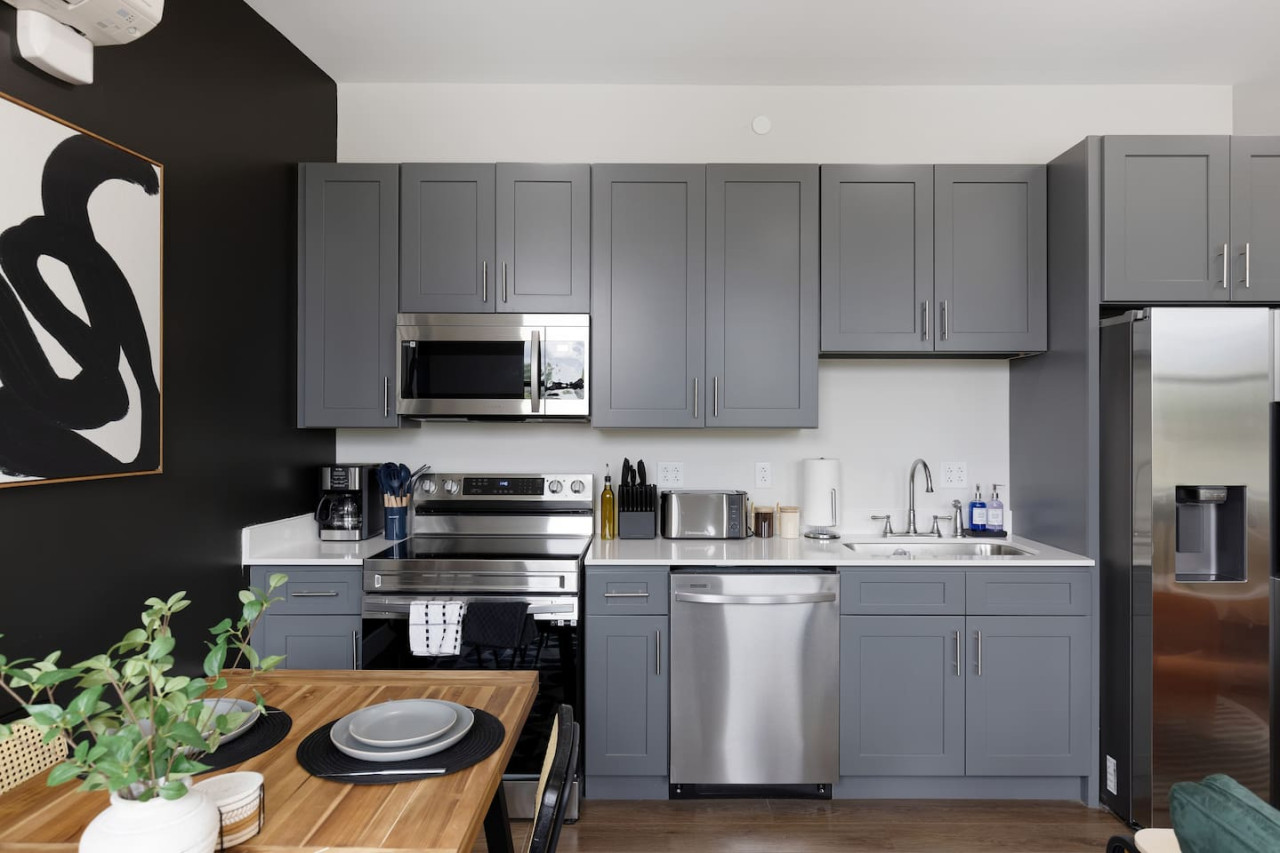Fully equipped kitchen with all the tools you need for a perfect culinary experience. Enjoy the convenience of having everything at your fingertips!