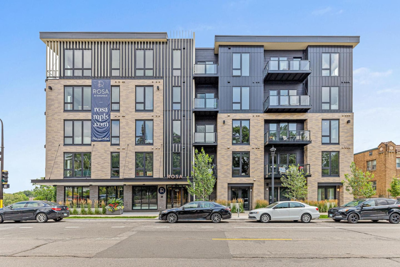 The outdoor area is a blend of modern and classic design elements, creating a welcoming and stylish facade.