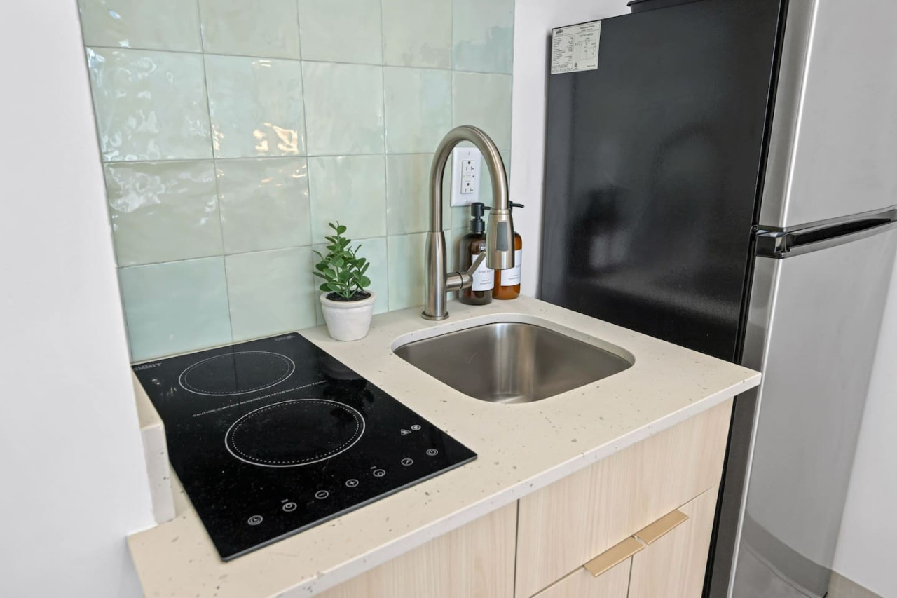 As you step into the kitchen, the clean lines and functional design make you eager to start cooking your favorite dishes.