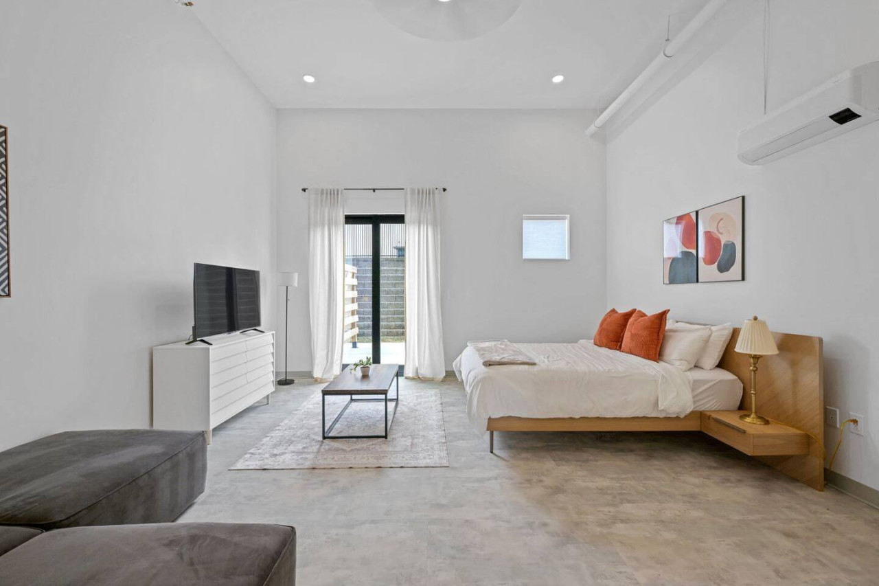 As you enter the bedroom, the sophisticated decor and plush bedding create a space where you can truly unwind.