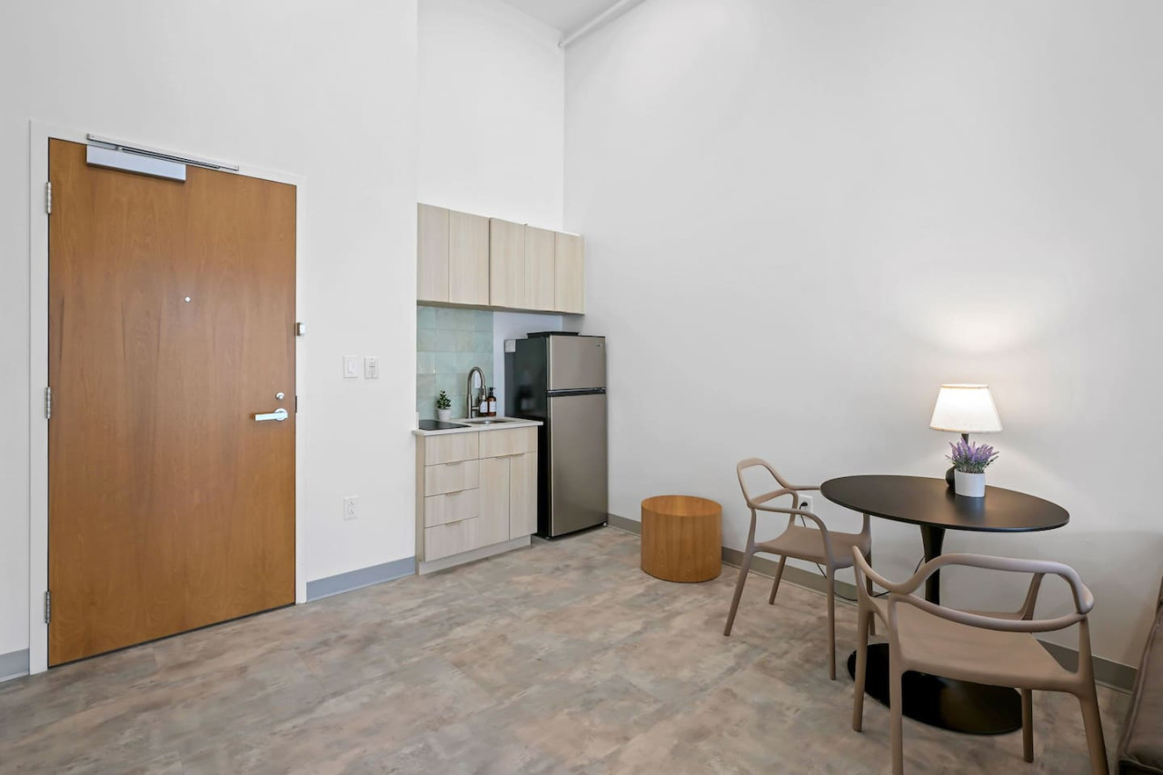 The dining area encourages you to gather with friends, enjoy a drink, and create lasting memories.