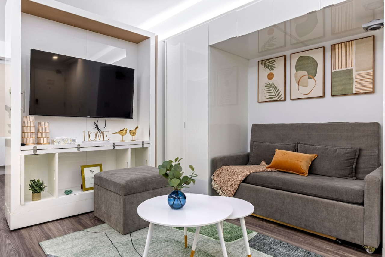 Relax in the living room and watch your favorite shows, lounging is a great way to unwind after a long day.