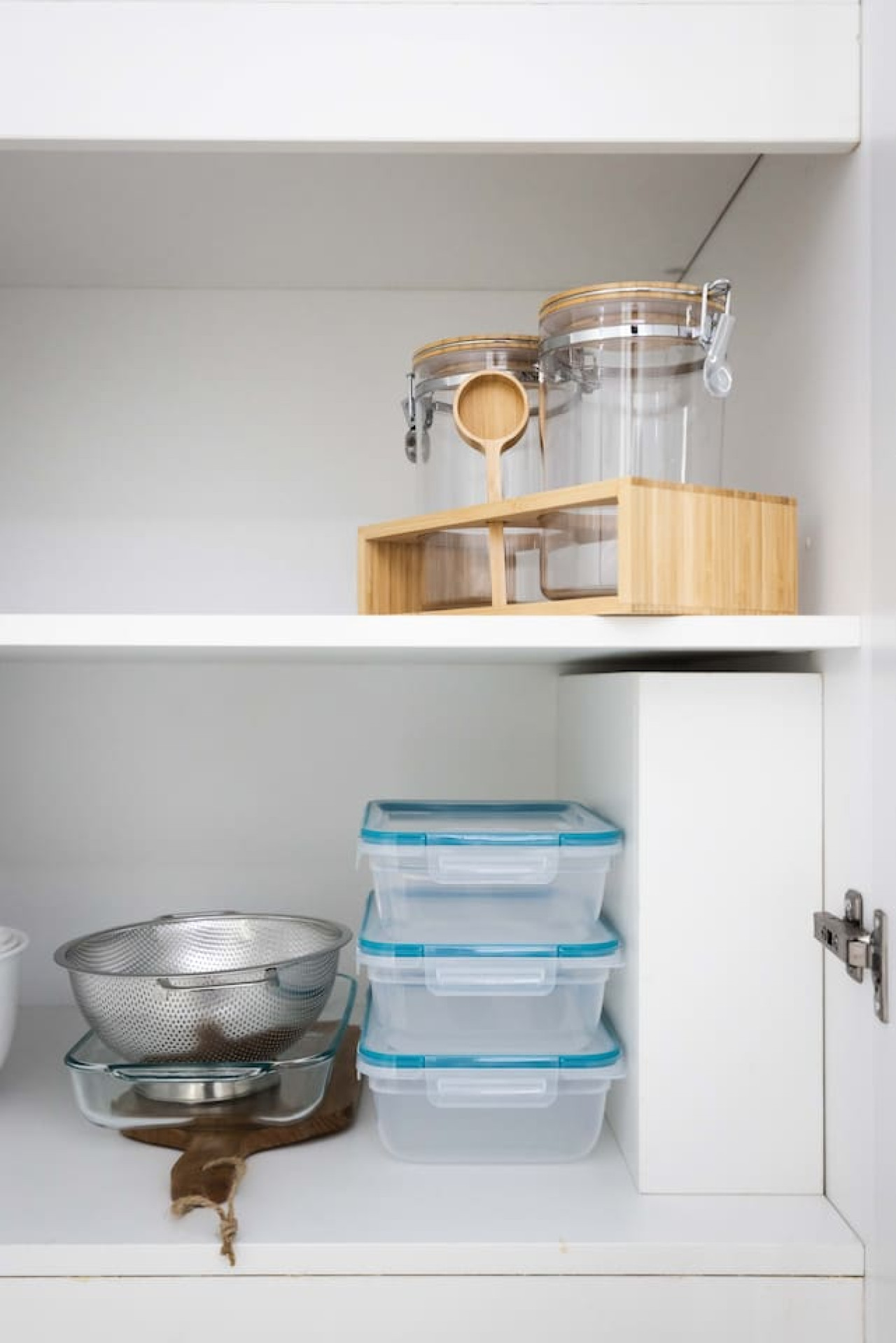 Kitchen cabinets stocked with cooking wares, glassware and silverwares, ideal for mixing up your favorite meals and drinks during your stay.