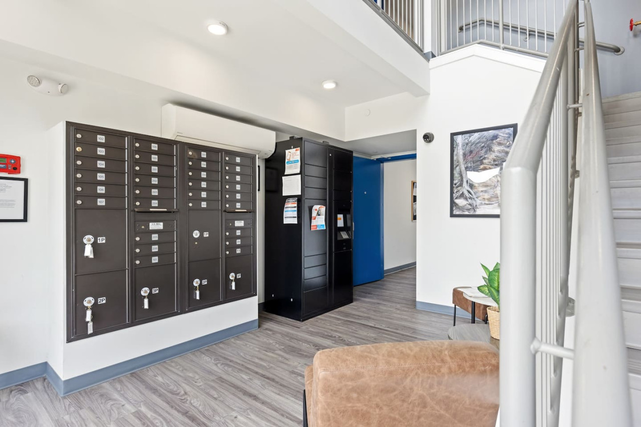 The staircase is a focal point of the home, with its graceful lines and stylish details adding to the overall charm.